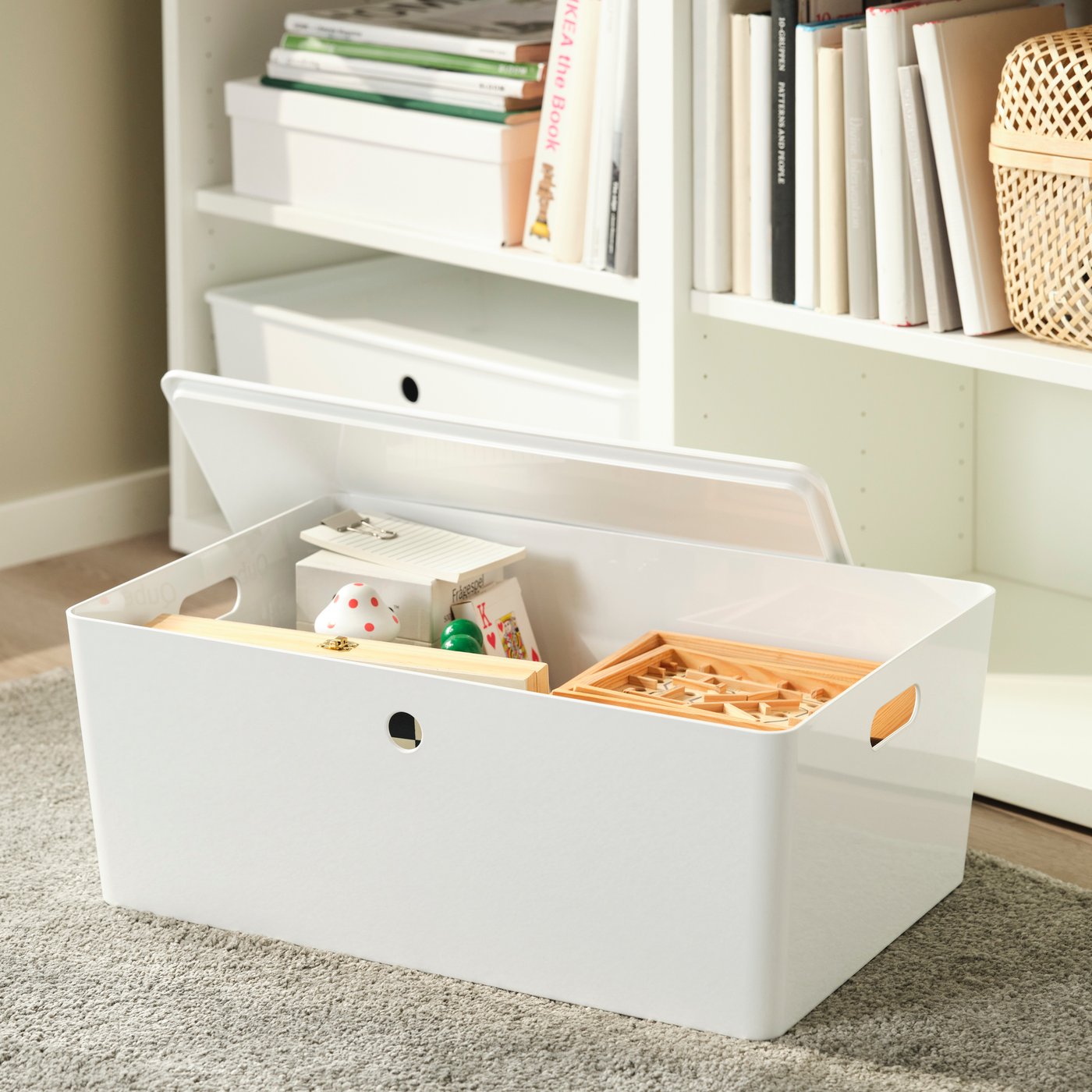 A white KUGGIS box in the living room