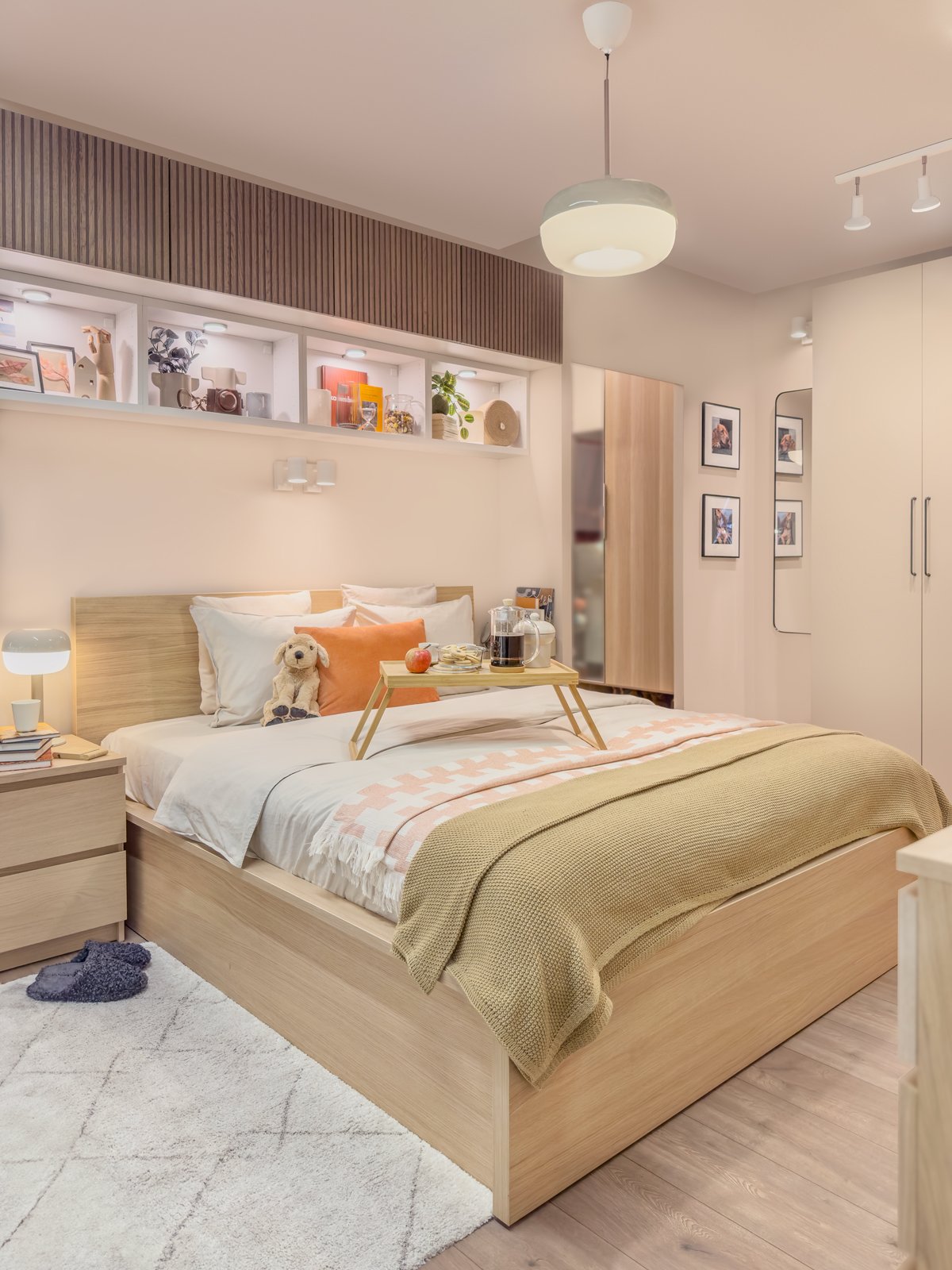 A white stained oak veneer MALM ottoman bed in the bedroom