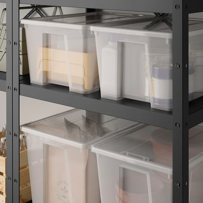 Must metallist riiul läbipaistvate plastkarpidega, alt suurim.
